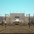 Ancient City Gate With Stone Archway Yellow Flags Trees Dirt Road And Blue Sky