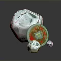 Decorative Grey Stone Object With Round Shield Featuring Red And Yellow Pattern And Small Stones