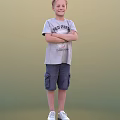 Man in Gray T-shirt and Blue Cargo Shorts Standing with Arms Crossed Against Green Background