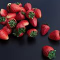 Fresh Ripe Strawberries with Red Fruit and Green Leaves on Black Background