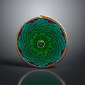 Round Green Lotus Pattern Clothing Accessory With Central Emerald Gemstone And Gold Edge