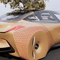BMW Golden Concept Car With Sleek Mesh Design Transparent Roof And Tree Nearby