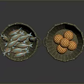 Orange And Blue Fish In Wicker Basket Alongside Pineapple Filled Basket