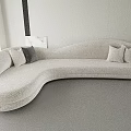Modern Light Gray Curved Sectional Sofa With Comfortable Cushions In Minimalist Interior
