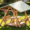 Wooden Garden Gazebo With Green Roof in Lawn Surrounded by Flowers Benches and Table