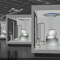 Modern Exhibition Display Spaces With White Installations Blue Lighting And Orange Clothed Person