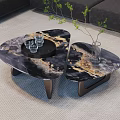 Elegant Black And Gold Marble Coffee Tables With Dark Legs In Living Room