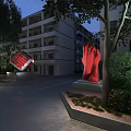 Commercial Street Night View With Lush Green Plants Surrounding Modern Buildings And Warm Lighting