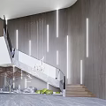 Modern Staircase Design With Glass Railing Gray Walls Vertical Light Strips And Marble Floor