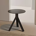 Modern Black Round Side Table With Cross Leg Design And Smooth Surface 3d model