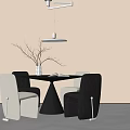 Modern Dining Table And Chairs With Pendant Light And Decorative Vase In Neutral Interior