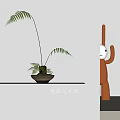 Bonsai Potted Fern Plant In Clay Pot On White Shelf With Orange Decorative Figure