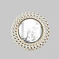 Round Golden Frame Mirror With Intricate Circular Pattern Reflecting Green Plant Shadows