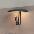 Modern Metal Wall Lamp with Dark Shade and Cylindrical Design on Wooden Wall