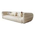 Plush Cream Leather Sectional Sofa With Stitched Design And Decorative Cushions