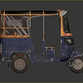 Vintage Blue Three Wheeled Tuk Tuk With Orange Canopy And Open Seating Design