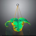 Hanging Green Plant With Large Leaves In Decorative Pot And Rope