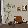 Cozy Brown Lounge Chair by Window with Green Plants and Two Paintings on Wall