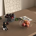 Fresh Cherries and Peaches in Glass Bowls on Wooden Table with Magazine Leaf and Figurine