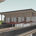 Rustic Guesthouse Building With Stone Walls Wooden Terrace And Red Umbrellas