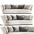Modern Beige Sectional Sofa With Gray Textured Pillows And Soft Upholstery Design