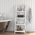 White Ladder Shelf In Bathroom With Stacked Towels And Toiletries