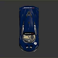Sleek Blue Race Car With Aerodynamic Rear Wing And Sporty Exterior Design