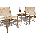 Wicker and Wooden Table and Chair Set With Wine Bottle Glasses And Fruit Plate