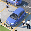 Blue Renault Car Parked in Parking Space With Yellow Lines and People Walking Nearby