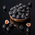 Fresh Ripe Dark Purple Figs in Wooden Bowl with Halved Red Flesh on Black Background