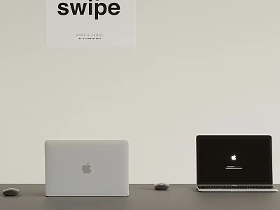 Black and White Apple Laptops with Mouse and Swipe Poster 3d model
