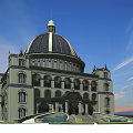Classical Hotel Building with Grand Dome Symmetrical Facade Ornate Entrance and Blue Sky Background