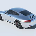 Silver Two Door Sports Car With Sleek Design Black Wheels And Modern Front Fascia