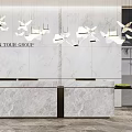 Hotel Lobby Interior With Marble Walls Reception Desk Pendant Lights Artwork Sofa And Green Plants