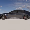 Gray Porsche Sports Wagon In Indoor Space With Grid Ceiling And Smooth Concrete Floor Reflection