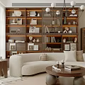 Modern Living Room With Curved Beige Sofa Round Coffee Table Lit Bookshelves Decorations Books Frames