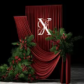 Floral Installation with Red Curtain White X Red Berries Green Foliage and White Wedding Dress