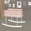 Pink Baby Crib With White Rocking Frame And Decorative Wall Art Letters