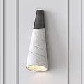 Modern Wall Lamp With White Marble Conical Shade And Black Top On Paneled White Wall