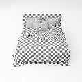 Double Bed With White Headboard Brown Quilt Beige Blanket And Brown Pillows