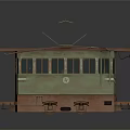 Vintage Tram With Green And Brown Exterior Overhead Trolley Pole And Windows