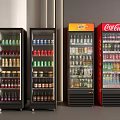 Four Upright Display Refrigerators Filled With Various Beverages Including Coca Cola