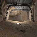 Reinforced Underground Tunnel Interior With Rock Walls And Steel Support Frames