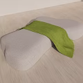 Abstract Shape Gray Fabric Sofa With Green Throw Blanket On Wooden Floor