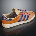 Vintage Orange Sneakers With Blue Stripes Purple Laces And White Sole Design