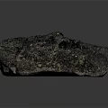 Unique Natural Dark Gray Stone Ornament With Porous Surface And Rough Texture