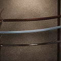 Vintage Decorative Sword With Golden Ornate Hilt Dark Blue Wrapped Handle And Wooden Scabbard