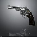 Silver Metal Revolver With Polished Finish And Classic Wooden Grip Design