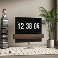 Modern TV with Soundbar on Patterned Rug Near Book Stack and Potted Plant