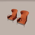 Two Orange Upholstered Massage Chairs With Modern Ergonomic Design And Metal Frames